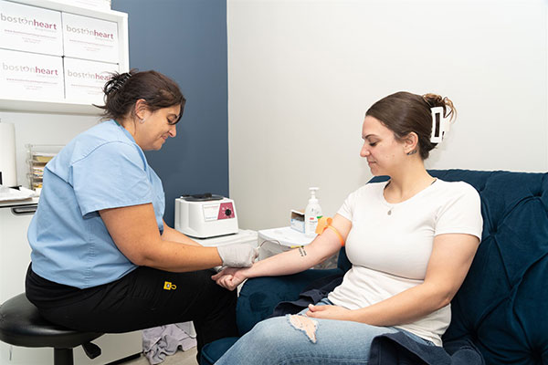 woman getting blood drawn for functional blood chemistry at In8 Wellness Center